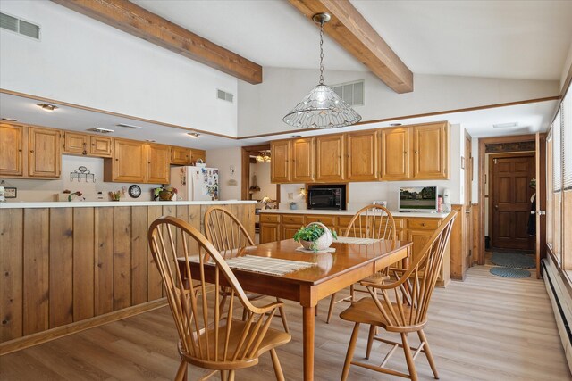 7317 Bircklan Dr, Canton, MI 48187 - dining space with light wood-type flooring and a baseboard radiator