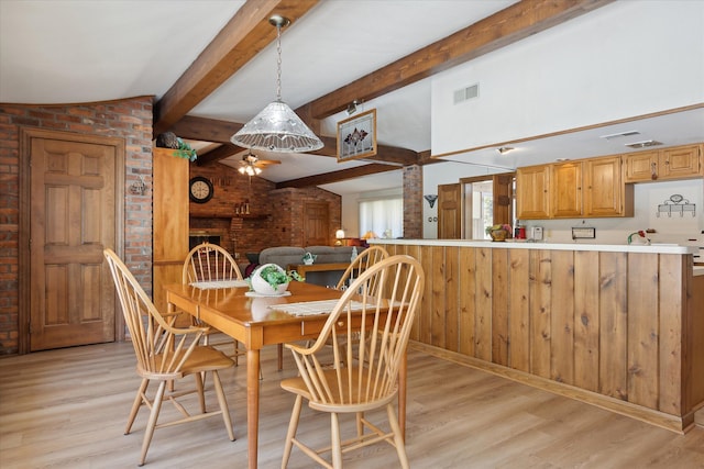 7317 Bircklan Dr, Canton, MI 48187 - dining space with a ceiling fan, light wood-type flooring, brick wall, and beamed ceiling