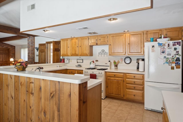 7317 Bircklan Dr, Canton, MI 48187 - kitchen featuring white appliances, light tile patterned floors, light countertops, a peninsula, and a sink