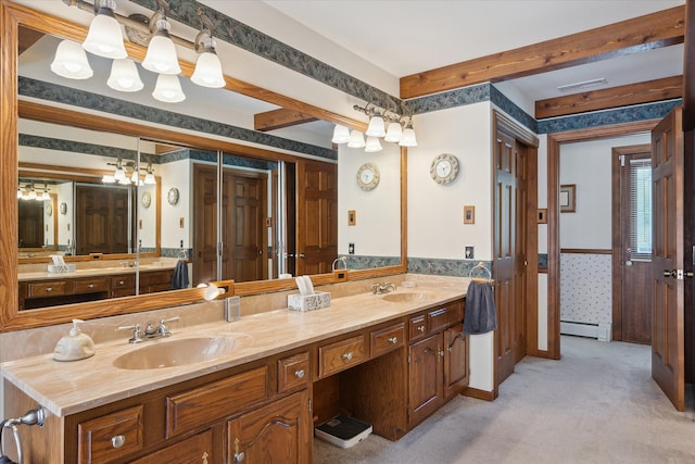 7317 Bircklan Dr, Canton, MI 48187 - full bathroom with a baseboard heating unit, double vanity, and a wainscoted wall
