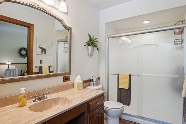 7317 Bircklan Dr, Canton, MI 48187 - bathroom with a shower stall, vanity, toilet, tile patterned floors, and recessed lighting