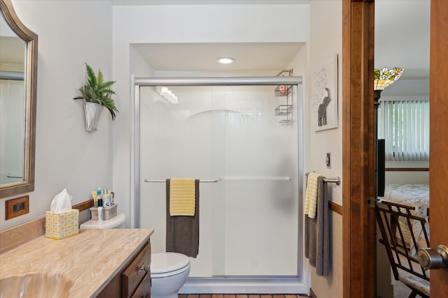7317 Bircklan Dr, Canton, MI 48187 - bathroom featuring a shower stall, toilet, vanity, and recessed lighting