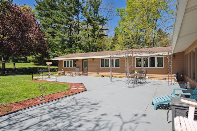 7317 Bircklan Dr, Canton, MI 48187 - back of property with a patio and a lawn