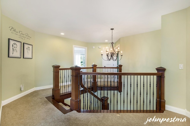 staircase with carpet, baseboards, a chandelier, and recessed lighting