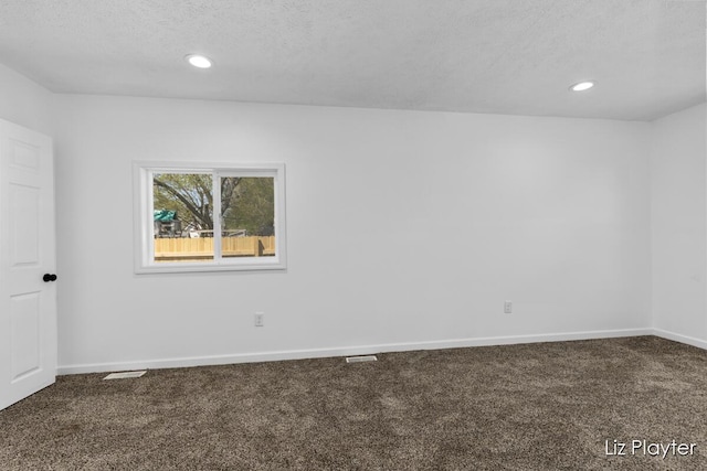 311 W Fenwick Rd, Fenwick, MI 48834 - carpeted empty room with baseboards, recessed lighting, and a textured ceiling