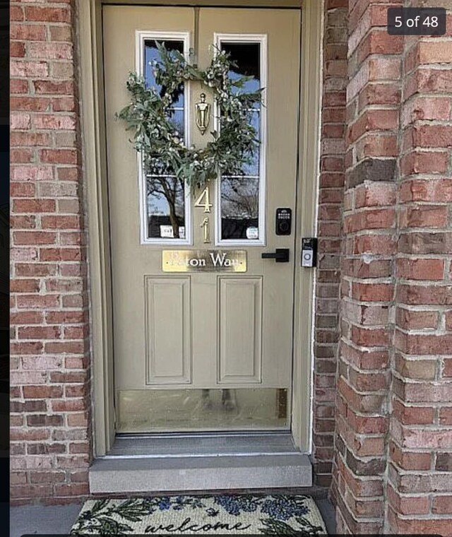141 Paton Way, Romeo, MI 48065 - entrance to property featuring brick siding