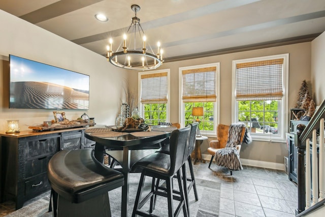 141 Paton Way, Romeo, MI 48065 - dining area featuring a chandelier, stone tile flooring, baseboards, and recessed lighting