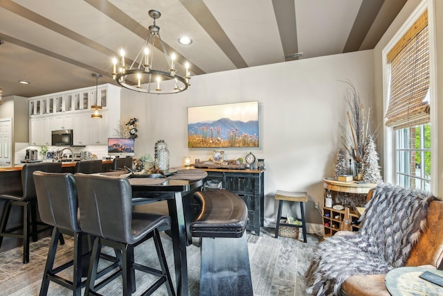 141 Paton Way, Romeo, MI 48065 - dining space featuring a chandelier, wood finished floors, and recessed lighting