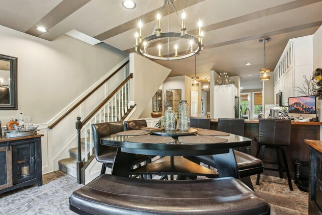 141 Paton Way, Romeo, MI 48065 - dining area featuring a chandelier, stairs, a decorative wall, wainscoting, and recessed lighting