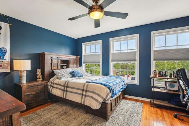 141 Paton Way, Romeo, MI 48065 - bedroom with wood finished floors, baseboards, and ceiling fan