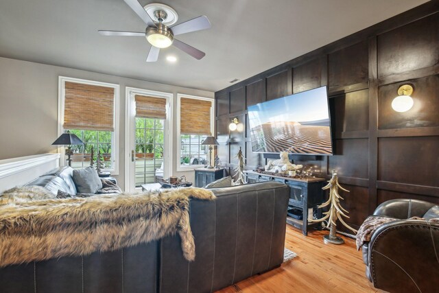 141 Paton Way, Romeo, MI 48065 - living area with ceiling fan and light wood-style flooring