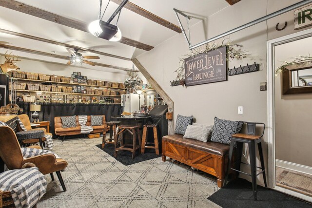 141 Paton Way, Romeo, MI 48065 - living room featuring a ceiling fan and beamed ceiling
