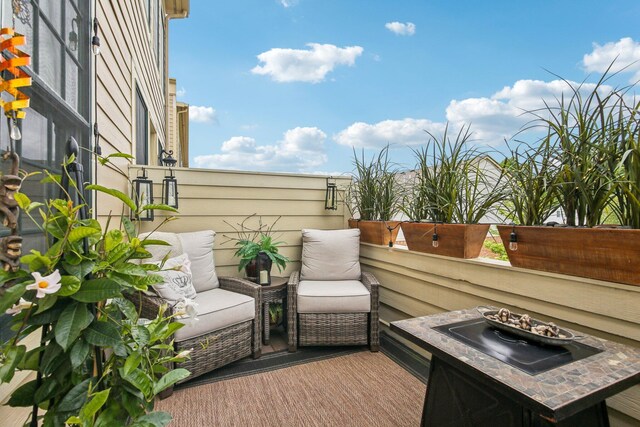 141 Paton Way, Romeo, MI 48065 - deck featuring an outdoor living space with a fire pit