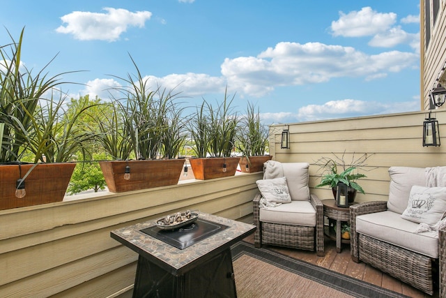 141 Paton Way, Romeo, MI 48065 - wooden deck with an outdoor living space with a fire pit
