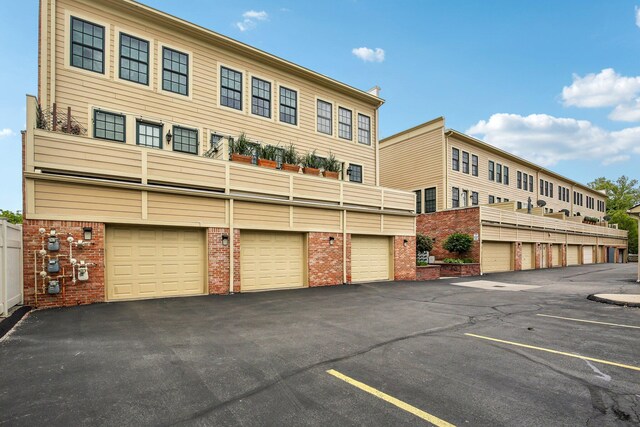 141 Paton Way, Romeo, MI 48065 - view of building exterior featuring uncovered parking