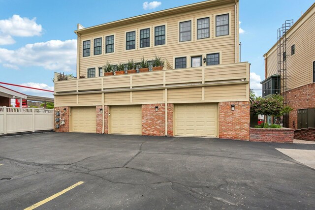 141 Paton Way, Romeo, MI 48065 - view of property featuring brick siding and driveway