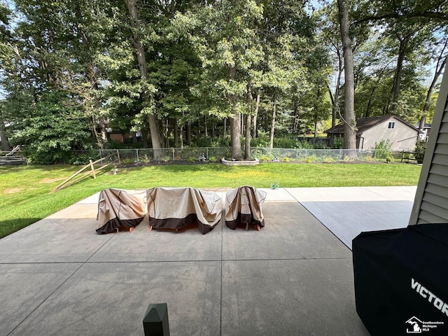 view of patio with view of scattered trees