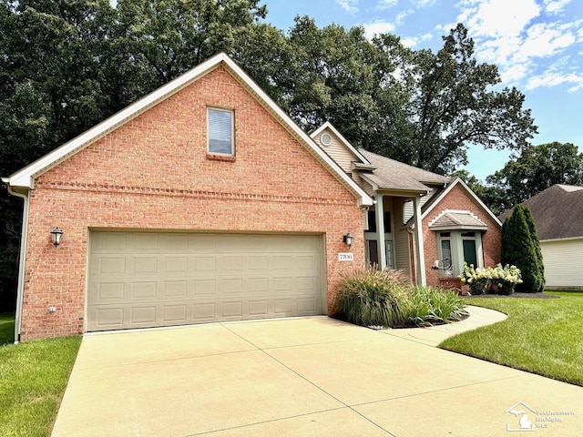 traditional home featuring brick siding, concrete driveway, a front lawn, and a garage