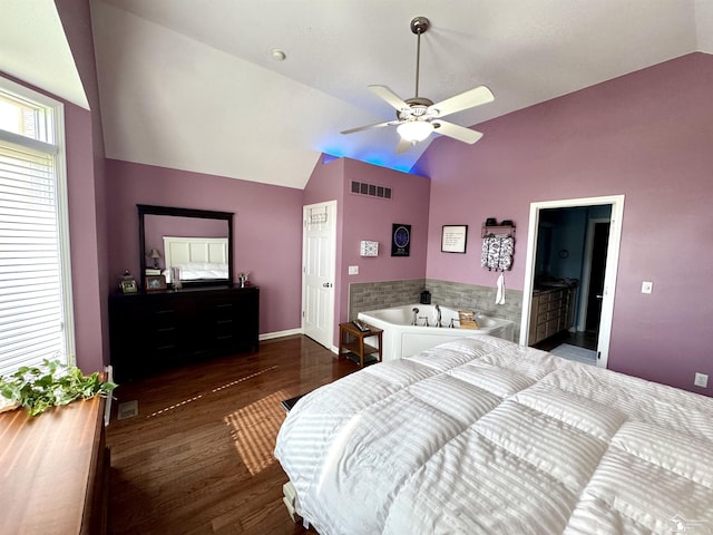 bedroom featuring vaulted ceiling, wood finished floors, baseboards, and a ceiling fan