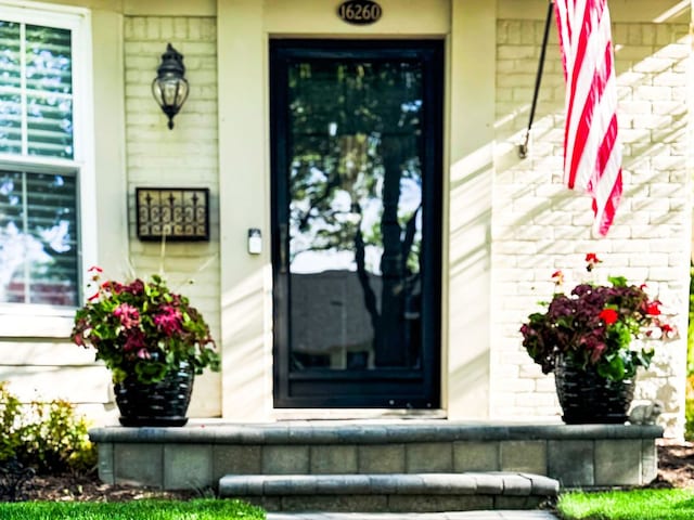 doorway to property featuring a porch