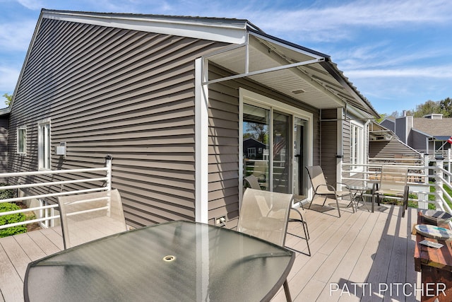 618 Edgewater Dr, Spring Lake, MI 49456 - deck featuring outdoor dining area