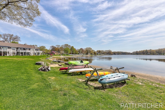 618 Edgewater Dr, Spring Lake, MI 49456 - view of green lawn featuring a water view