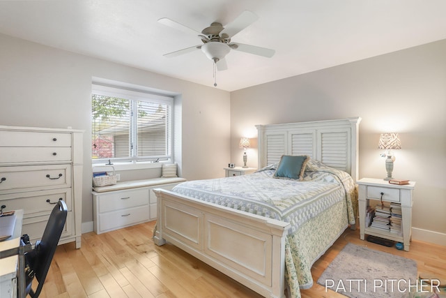618 Edgewater Dr, Spring Lake, MI 49456 - bedroom with light wood-style flooring, ceiling fan, and baseboards
