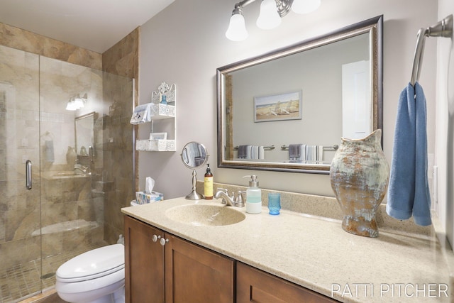618 Edgewater Dr, Spring Lake, MI 49456 - bathroom with a stall shower, toilet, and vanity