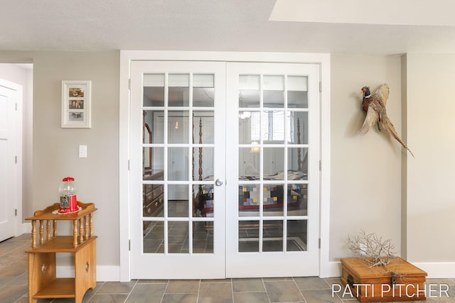 618 Edgewater Dr, Spring Lake, MI 49456 - entryway featuring french doors and baseboards
