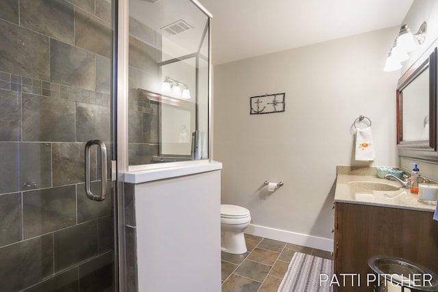 618 Edgewater Dr, Spring Lake, MI 49456 - bathroom with a stall shower, toilet, vanity, and baseboards