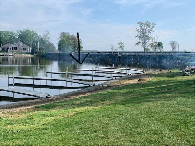 618 Edgewater Dr, Spring Lake, MI 49456 - dock area featuring a yard and a water view