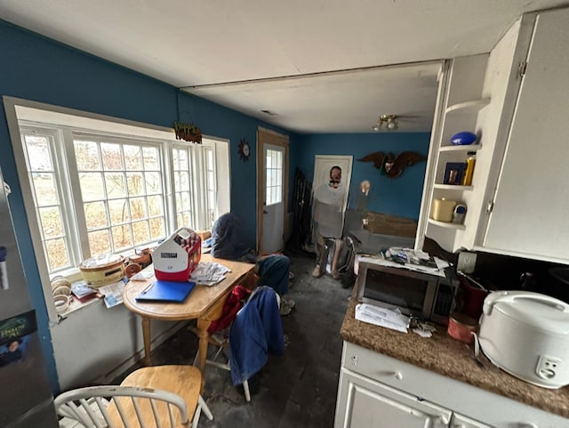 4201 Chicago Rd, Warren, MI 48092 - dining room with unfinished concrete flooring