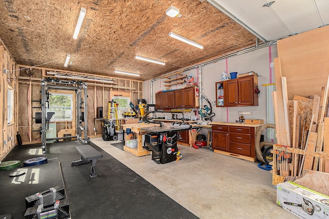 garage with a workshop area