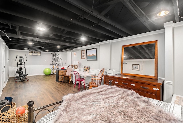 bedroom featuring wood finished floors