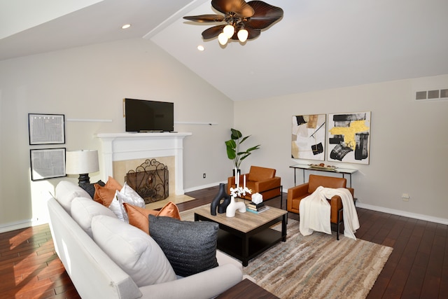 18516 Ranier Dr, Macomb, MI 48042 - living room with a ceiling fan, hardwood / wood-style flooring, baseboards, vaulted ceiling, and a fireplace with flush hearth
