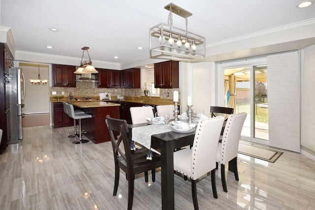 18516 Ranier Dr, Macomb, MI 48042 - dining room with ornamental molding, a chandelier, recessed lighting, and light wood-type flooring