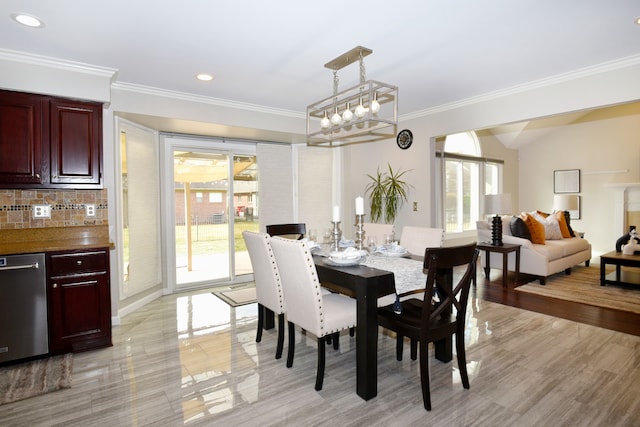 18516 Ranier Dr, Macomb, MI 48042 - dining space with crown molding, recessed lighting, and light wood-type flooring