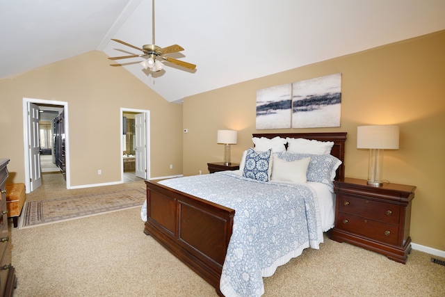18516 Ranier Dr, Macomb, MI 48042 - bedroom with light carpet, vaulted ceiling, baseboards, a walk in closet, and a ceiling fan