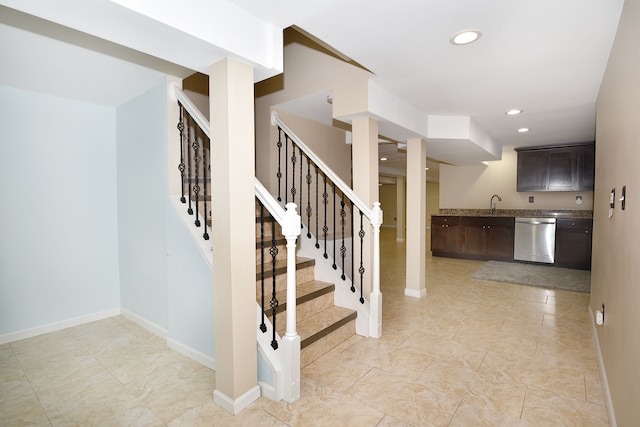 18516 Ranier Dr, Macomb, MI 48042 - stairway with recessed lighting, baseboards, and wet bar