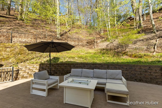 401 Stickney Ridge Rd, Grand Haven, MI 49417 - view of patio with an outdoor living space with a fire pit and a deck