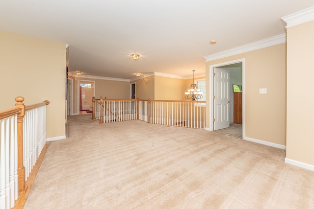 1090 Shetland Dr, South Lyon, MI 48178 - empty room featuring a chandelier, ornamental molding, light colored carpet, and baseboards