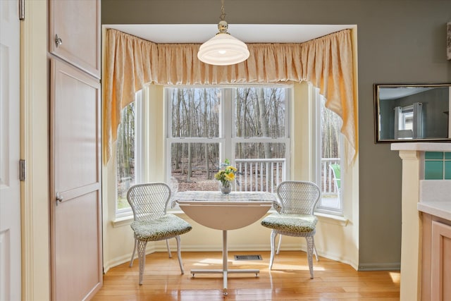 3818 Hillsdale Dr, Auburn Hills, MI 48326 - dining space featuring baseboards and light wood-style flooring