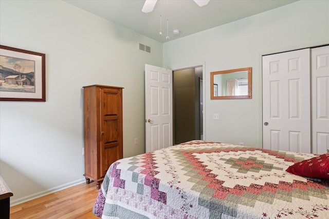 3818 Hillsdale Dr, Auburn Hills, MI 48326 - bedroom featuring light wood finished floors, a closet, baseboards, and ceiling fan