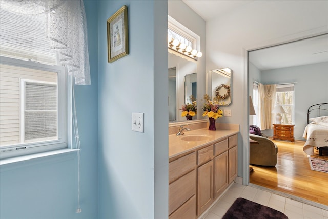 3818 Hillsdale Dr, Auburn Hills, MI 48326 - bathroom featuring plenty of natural light, tile patterned flooring, connected bathroom, and vanity