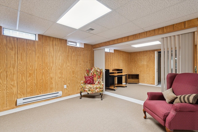 3818 Hillsdale Dr, Auburn Hills, MI 48326 - living area featuring a baseboard radiator, wood walls, carpet floors, and a paneled ceiling
