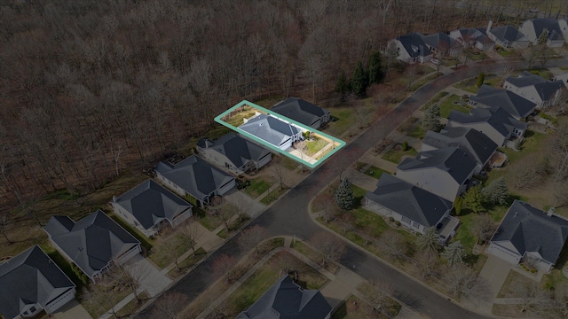 3818 Hillsdale Dr, Auburn Hills, MI 48326 - aerial view of property and surrounding area featuring nearby suburban area, property boundaries highlighted, and a heavily wooded area