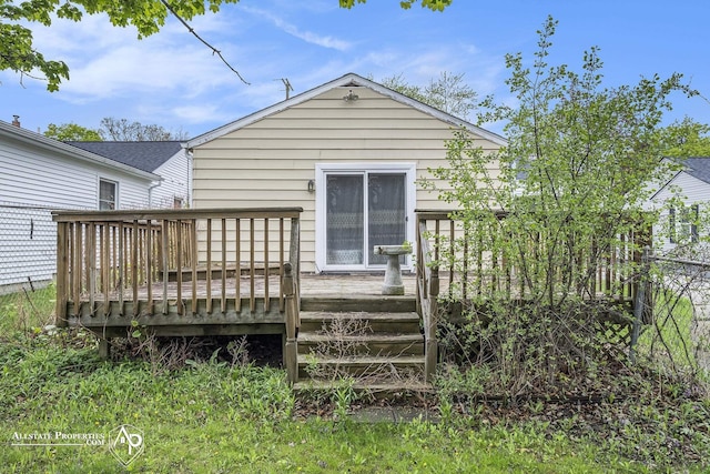 rear view of property with a deck