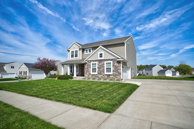 7051 Wildflower, Grand Blanc, MI 48439 - view of front of house with driveway, stone siding, an attached garage, and a front lawn