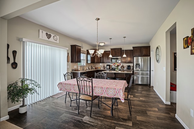 7051 Wildflower, Grand Blanc, MI 48439 - dining room featuring dark wood-style flooring, baseboards, and a chandelier