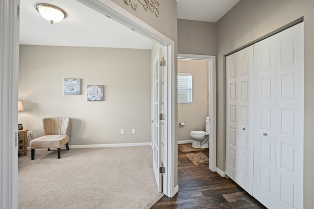 7051 Wildflower, Grand Blanc, MI 48439 - sitting room featuring baseboards and dark carpet